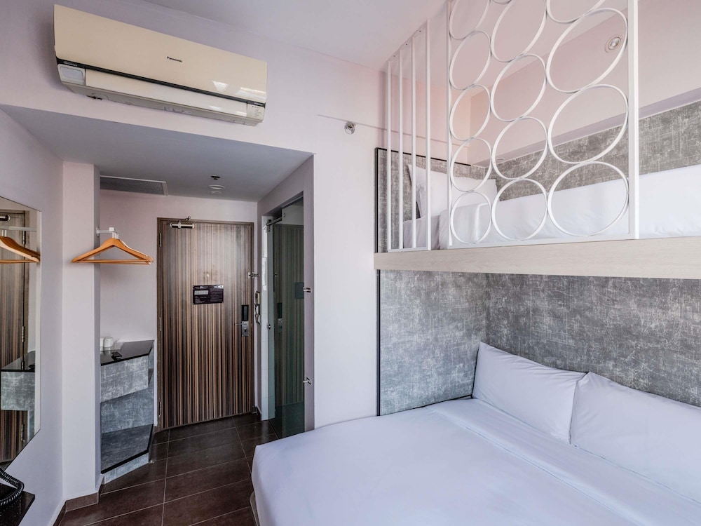 Habitación Superior con 1 cama doble y 1 cama individual del hotel Ibis Budget Singapore Pearl (sg Clean). Foto 4