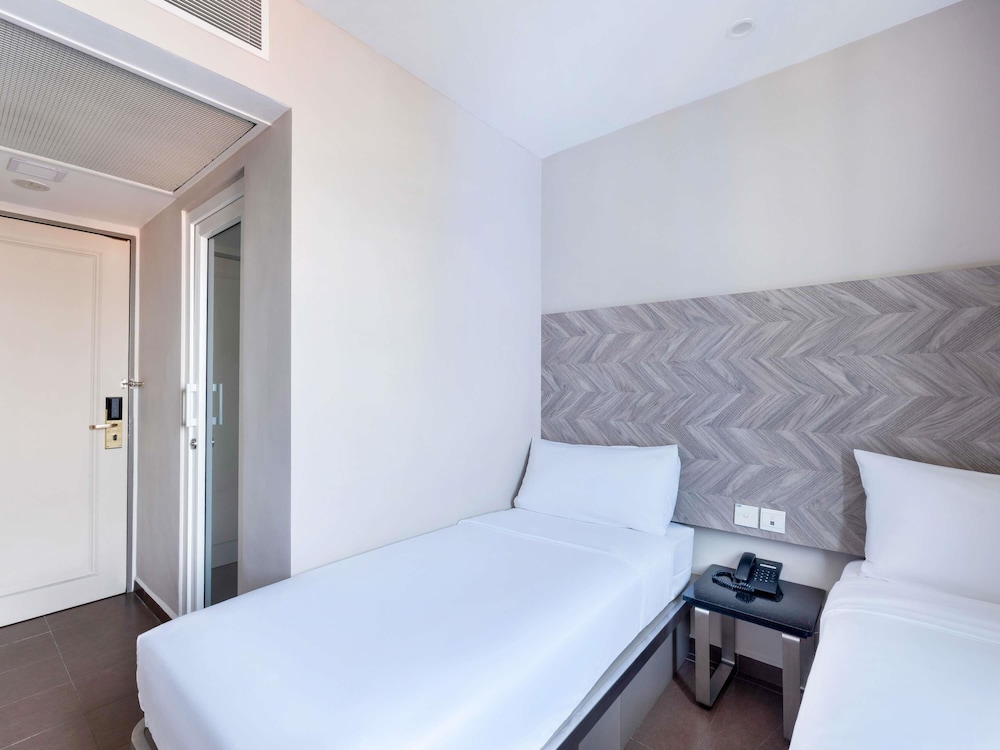 Habitación Deluxe con 2 camas individuales del hotel Ibis Budget Singapore Ruby. Foto 3