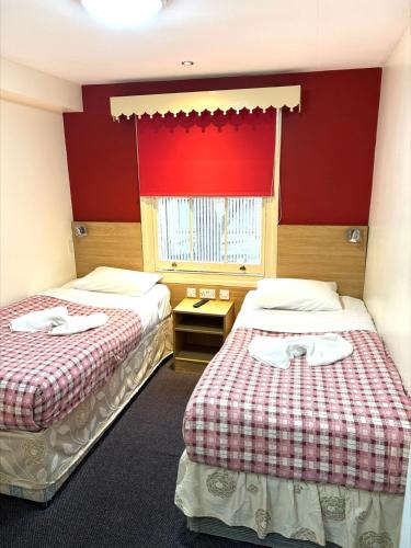 Habitación Doble con aseo privado y ducha - 2 camas del hotel Carlton