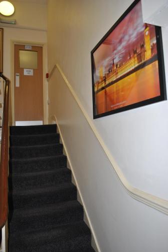 Habitación Triple con aseo y ducha privados del hotel Carlton. Foto 7