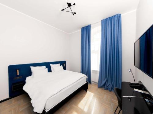 Habitación Doble Clásica del hotel TRIBE Riga City Centre. Foto 4