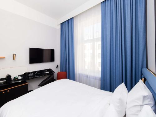 Habitación Doble Clásica del hotel TRIBE Riga City Centre. Foto 8