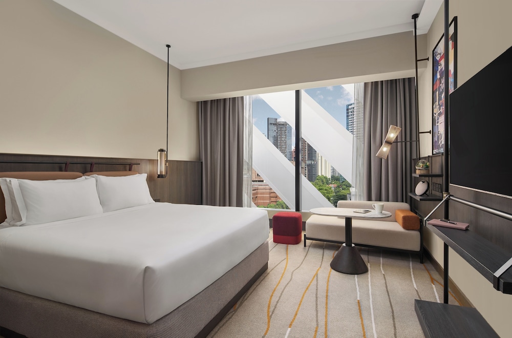 HABITACIÓN PREMIER, 1 Cama King, Vistas a Orchard - Paragon del hotel Pullman Singapore Orchard. Foto 1