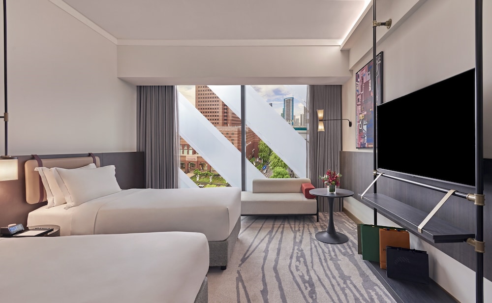 HABITACIÓN PREMIER, 2 Camas Individuales, Vistas a Orchard - Paragon del hotel Pullman Singapore Orchard. Foto 1