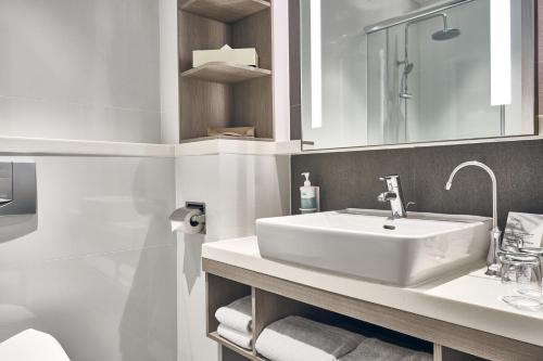 Superior Room, 2 Single Beds del hotel Novotel Singapore on Kitchener. Foto 2