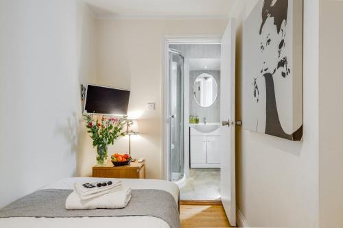Habitación Individual Estándar del hotel 1 LEXHAM GARDENS. Foto 4