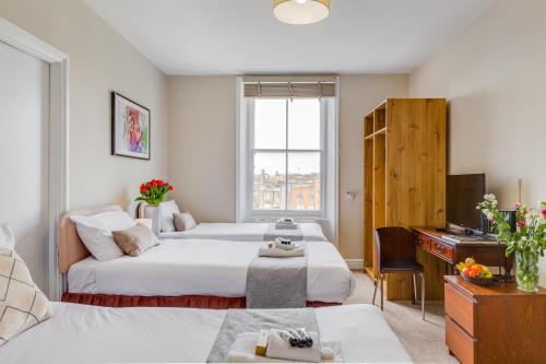 Habitación Cuádruple Estándar del hotel 1 LEXHAM GARDENS. Foto 5