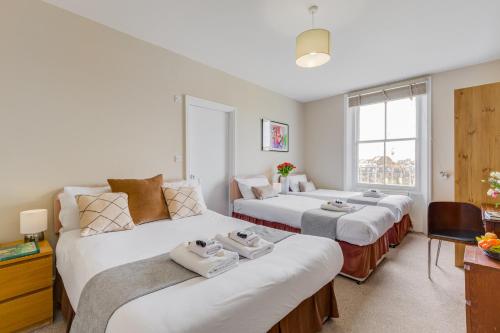 Habitación Cuádruple Estándar del hotel 1 LEXHAM GARDENS. Foto 6