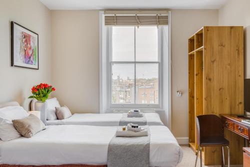 Habitación Cuádruple Estándar del hotel 1 LEXHAM GARDENS. Foto 8