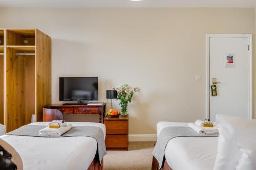 Habitación Cuádruple Estándar del hotel 1 LEXHAM GARDENS. Foto 9