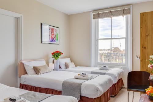 Habitación Cuádruple Estándar del hotel 1 LEXHAM GARDENS. Foto 10