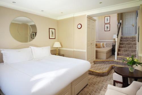 Habitación Clásica con cama extragrande del hotel The Montague On The Gardens. Foto 6
