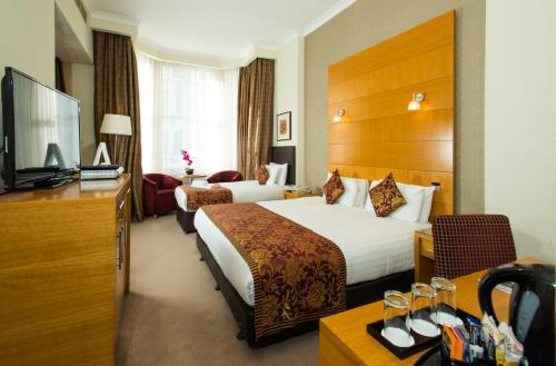 Habitación Triple Executive del hotel The Park City Grand Plaza Kensington. Foto 7