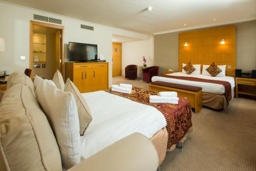 Suite Familiar del hotel The Park City Grand Plaza Kensington. Foto 1