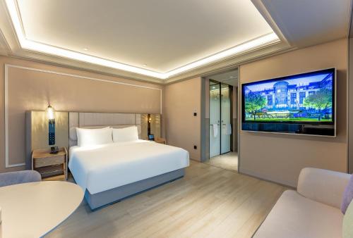 Habitación Superior con cama extragrande del hotel Mercure Shanghai Lujiazui. Foto 2