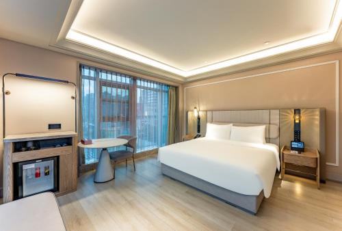 Habitación Superior con cama extragrande del hotel Mercure Shanghai Lujiazui. Foto 3