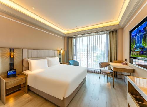 Habitación Superior con cama extragrande del hotel Mercure Shanghai Lujiazui. Foto 4