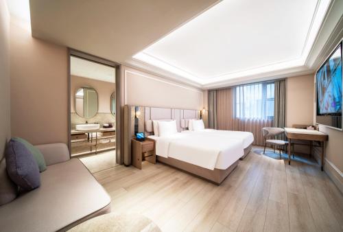 Habitación Doble Privilege - 2 camas del hotel Mercure Shanghai Lujiazui. Foto 1