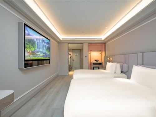 Habitación Familiar Deluxe del hotel Mercure Shanghai Lujiazui