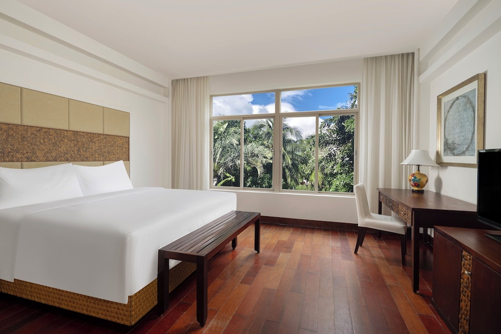 Habitación Deluxe, 2 camas individuales, vistas a la piscina del hotel Grand Mercure Sanya Yalong Bay. Foto 1