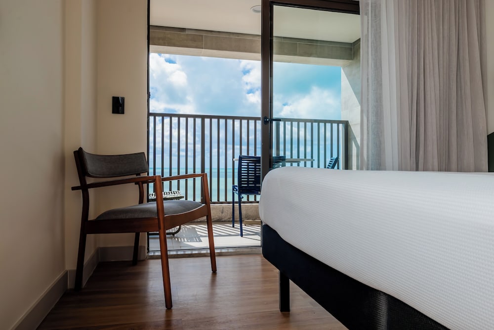 Habitación estándar con vistas al mar, 2 camas individuales y balcón - comunicante del hotel ibis Styles Maragogi. Foto 6