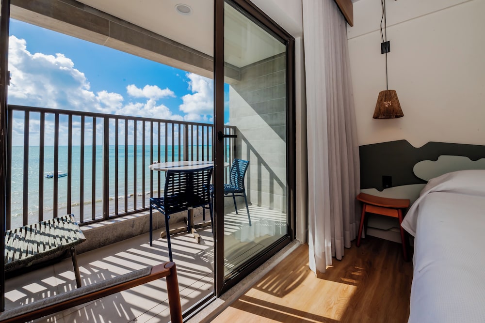 Habitación estándar con vistas al mar, 2 camas individuales y balcón - comunicante del hotel ibis Styles Maragogi. Foto 13