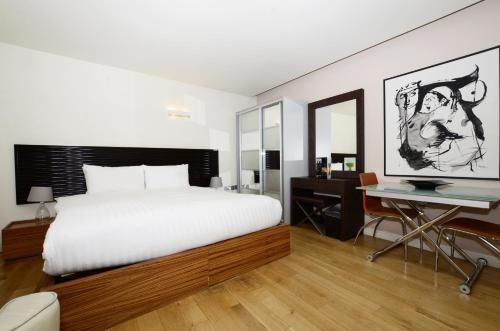 Apartamento Amplio de planta abierta con 1 dormitorio del hotel The Harrington Collection. Foto 1