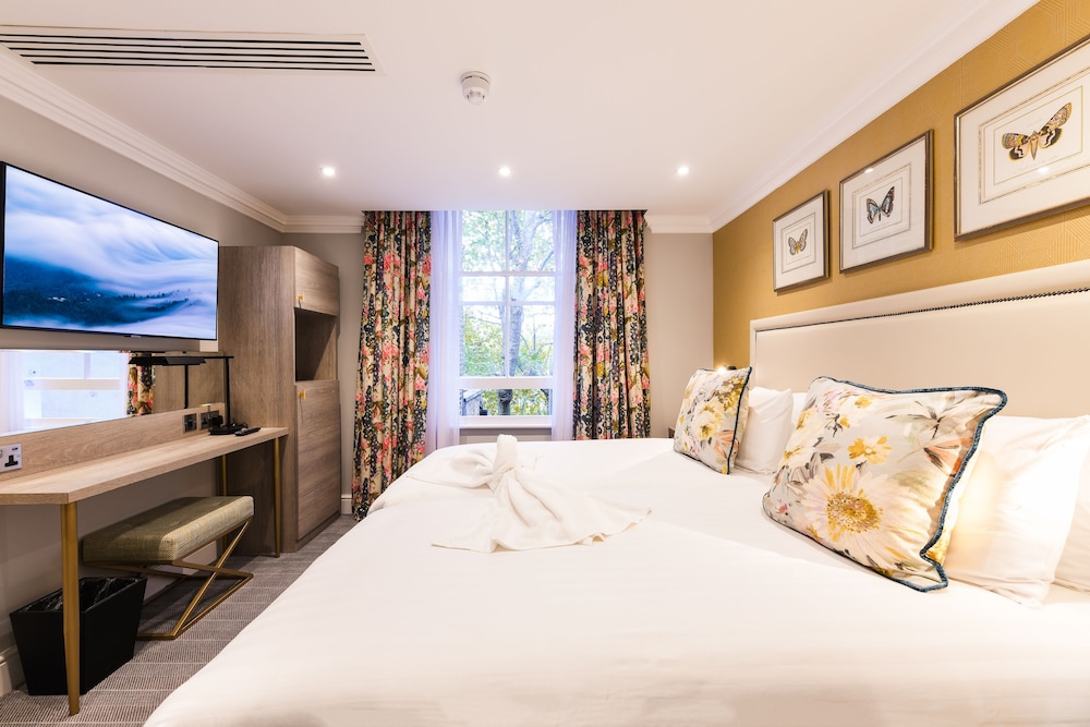 Habitación con 2 camas individuales del hotel Byron London. Foto 5