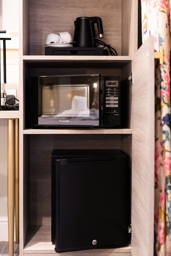 Habitación superior con 1 cama doble o 2 individuales del hotel Byron London. Foto 3