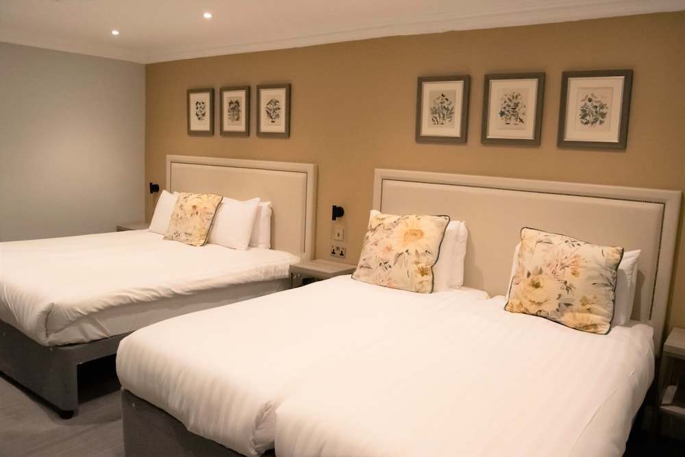 Habitación cuádruple, 2 camas dobles (lower ground floor) del hotel Byron London