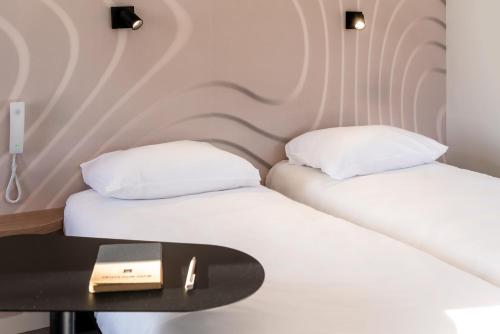 Habitación Doble Confort - 2 camas del hotel ibis Styles Cabriès Aix-en-Provence TGV. Foto 3