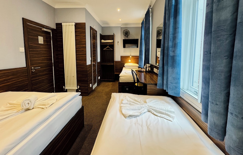 Habitación cuádruple del hotel Crestfield. Foto 4