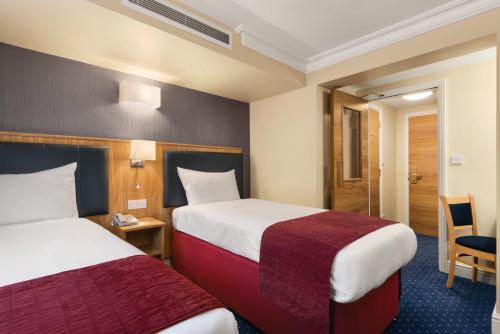 Habitación Doble - No fumadores - 2 camas del hotel Days Inn By Wyndham London Hyde Park. Foto 1