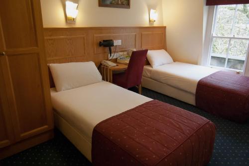 Habitación Doble - No fumadores - 2 camas del hotel Days Inn By Wyndham London Hyde Park. Foto 2