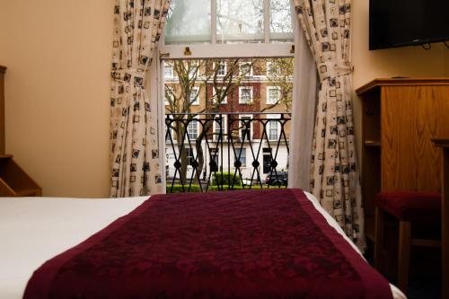 Habitación Doble - No fumadores del hotel Days Inn By Wyndham London Hyde Park. Foto 3