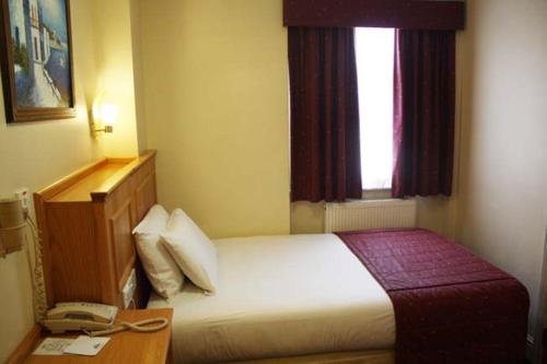 Habitación Individual - No fumadores del hotel Days Inn By Wyndham London Hyde Park. Foto 1