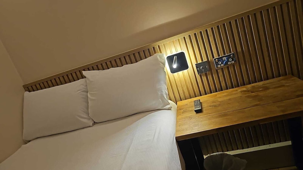 Habitación individual clásica del hotel Exhibition Court Hotel 4. Foto 5