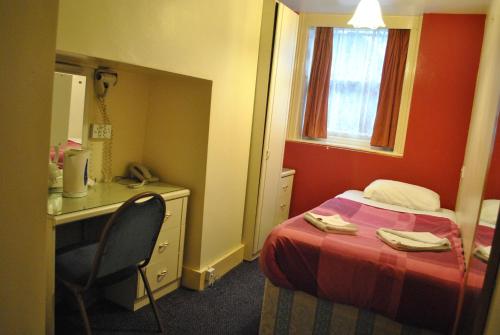 Habitación Individual del hotel Guilford House. Foto 2