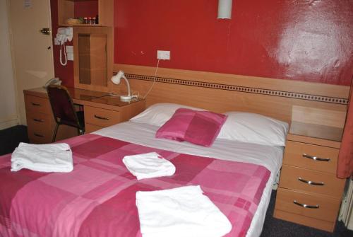 Habitación Triple del hotel Guilford House. Foto 1