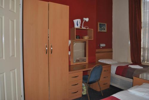 Habitación Triple del hotel Guilford House. Foto 2