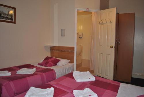 Habitación Triple del hotel Guilford House. Foto 6