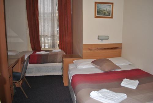 Habitación Triple del hotel Guilford House. Foto 7