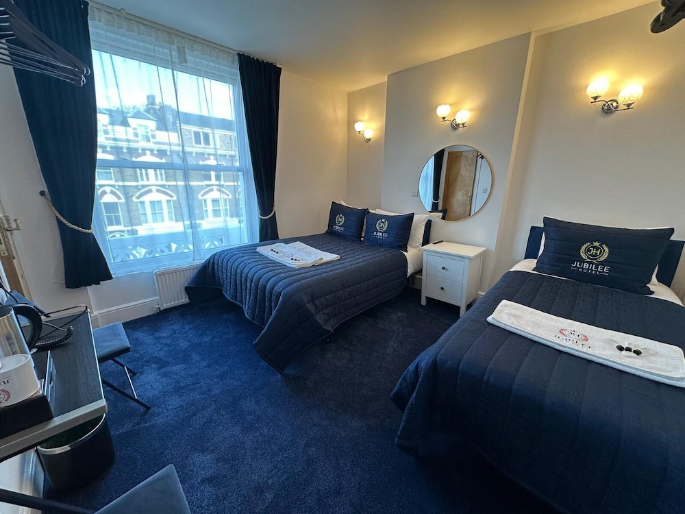 Habitación Triple del hotel Jubilee Kensington. Foto 2