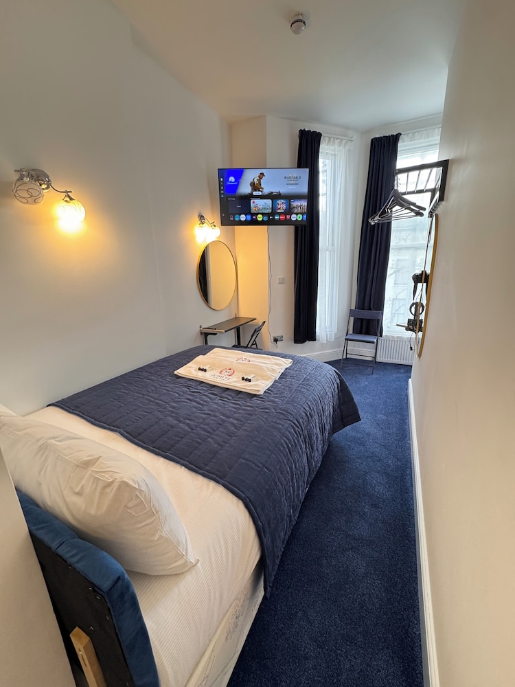 Habitación estándar doble del hotel Jubilee Kensington. Foto 3