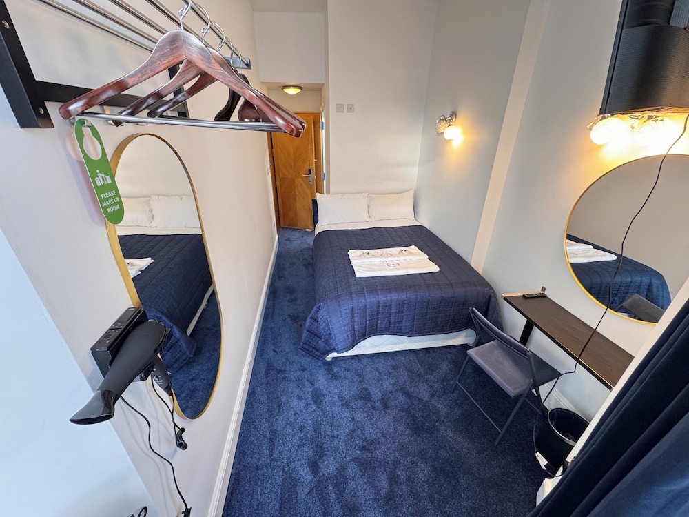 Habitación estándar doble del hotel Jubilee Kensington. Foto 4