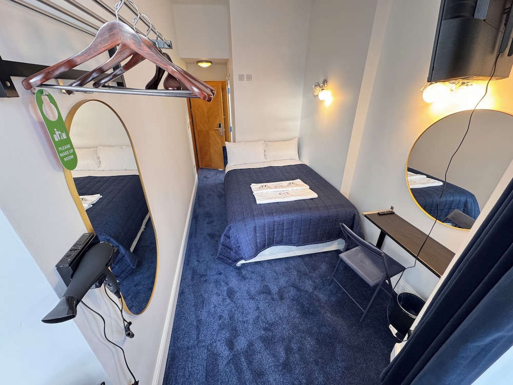 Habitación estándar doble del hotel Jubilee Kensington. Foto 1