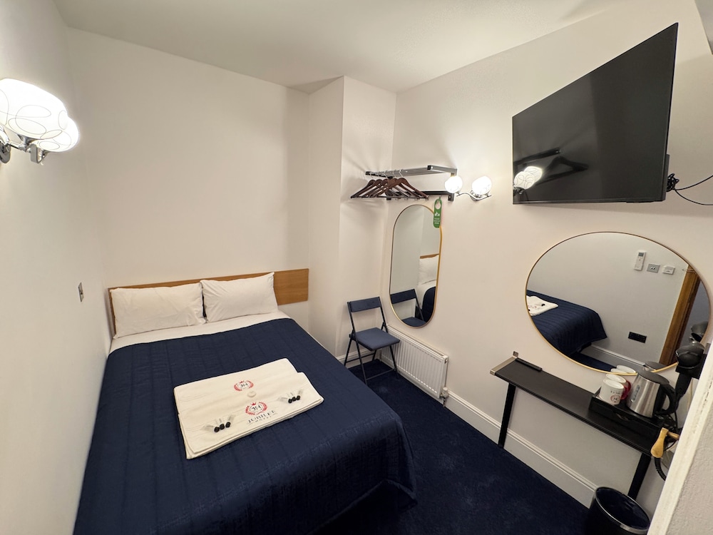 Habitación económica doble del hotel Holland Inn. Foto 6