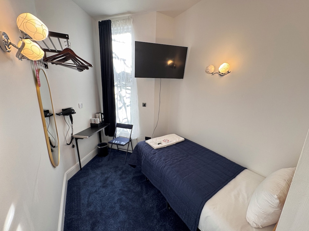 Habitación individual del hotel Holland Inn. Foto 4