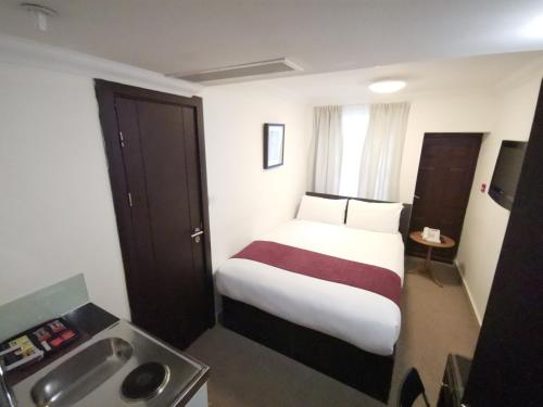 Habitación Doble Económica del hotel The Royale Chulan Hyde Park. Foto 20