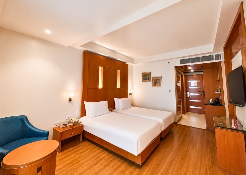 Habitación Deluxe con camas individuales, no fumadores del hotel Ramada By Wyndham Jaipur. Foto 6